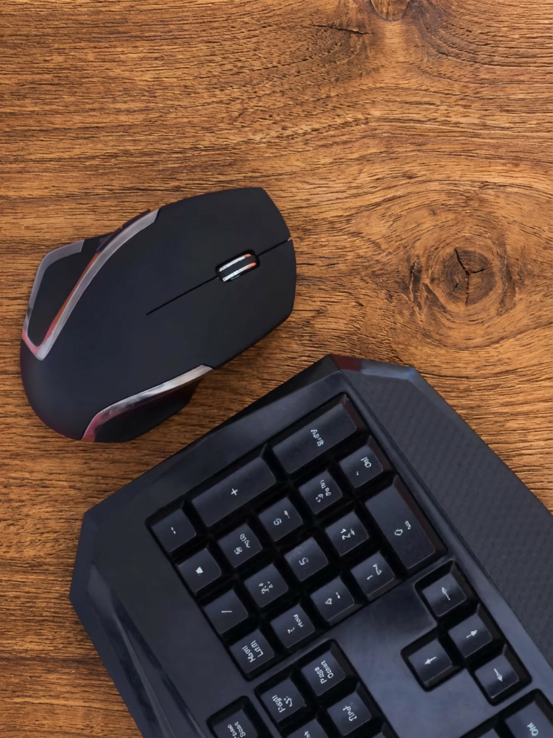 Mechanical keyboard and ergonomic mouse on a clean office desk setup for productivity